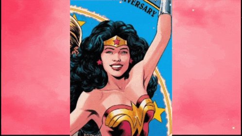 a woman in a wonder woman costume is smiling and holding her arm up in the air .