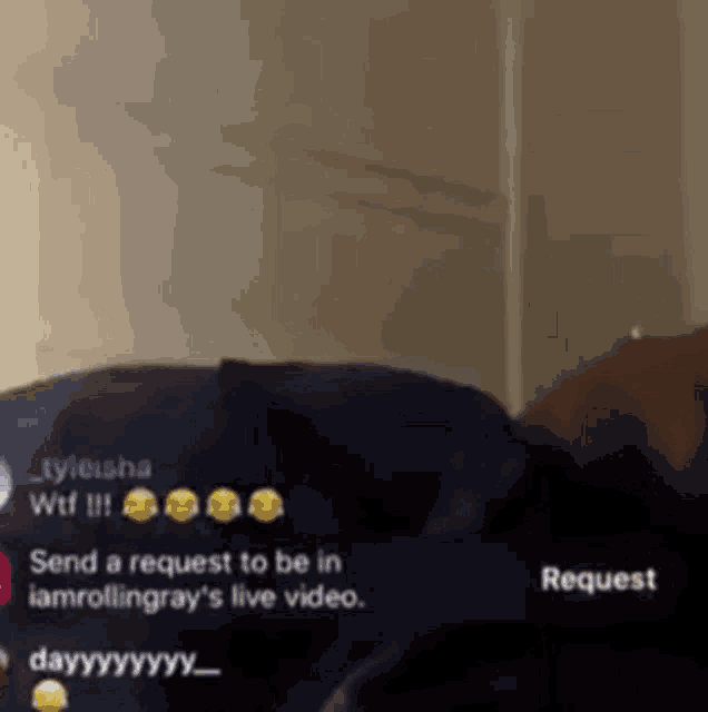 a person is laying on a bed with a request to be in a video .