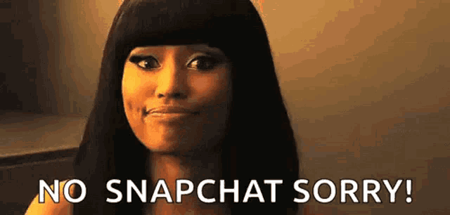 a woman with long black hair is making a face and saying `` no snapchat sorry ! ''