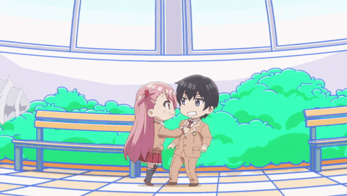 a boy and a girl are standing next to each other in a cartoon