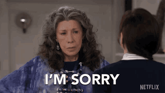 a woman with gray hair says i 'm sorry