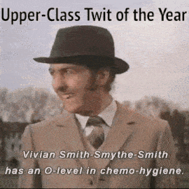 a man in a suit and tie is wearing a hat and has an o level in chemo hygiene .