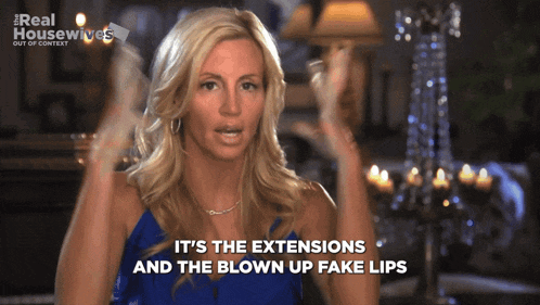 a woman says it 's the extensions and the blown up fake lips on a screen