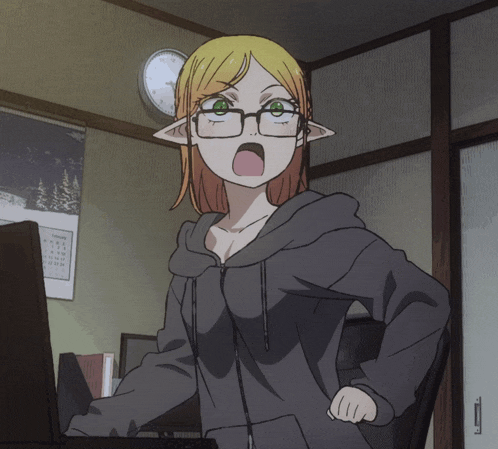 a girl with glasses is standing in front of a computer with a calendar on the wall behind her that shows the month of january
