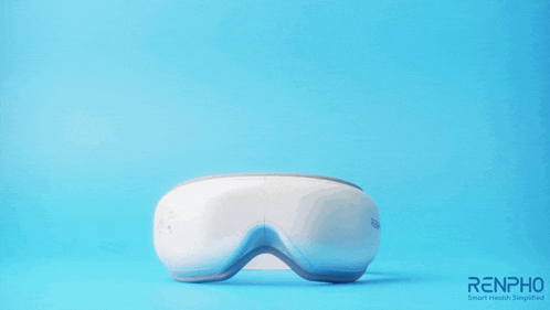 a blue background with the words eye massager in orange letters