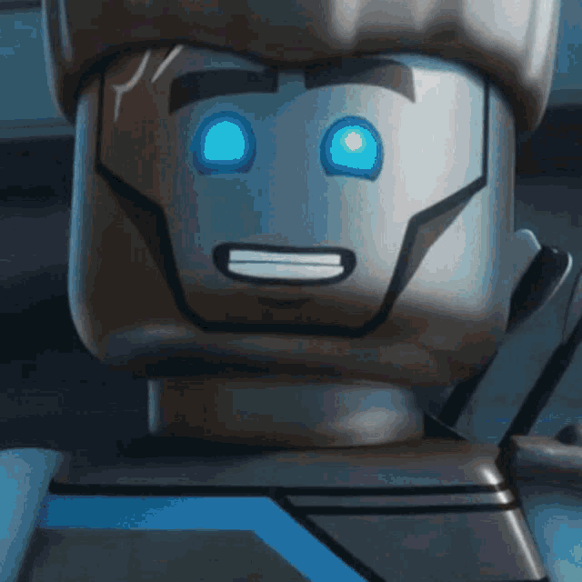 a close up of a lego character 's face with blue eyes