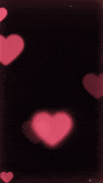 a picture of a man and a woman with hearts around them