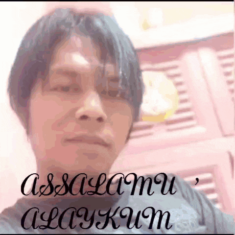 a man is taking a selfie with the words " assalamu alaykum " written on the bottom