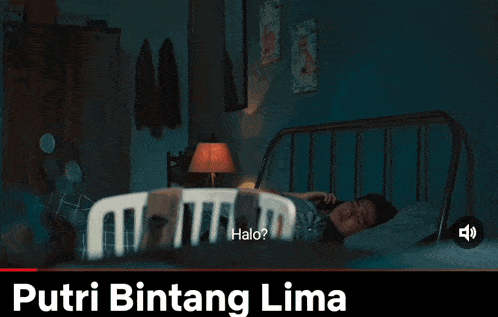 a woman is laying on a bed talking on a cell phone and the words halo are above her