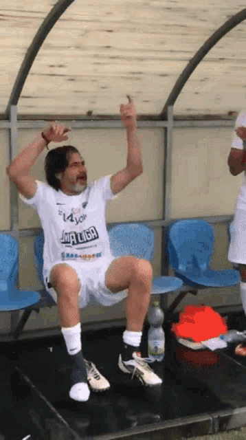 a man wearing a jersey that says jaa liga