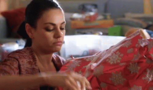 Wrapping Presents GIF - Mila Kunis A Bad Moms Christmas Wrapped Presents GIFs