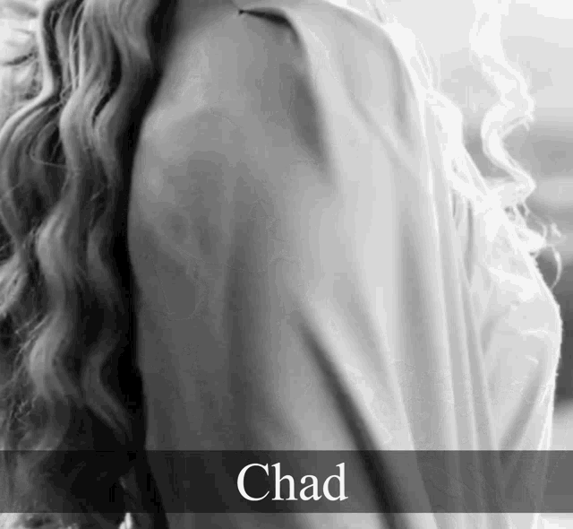a black and white photo of a woman 's back and the name chad