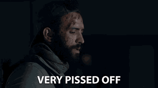 a man with blood on his forehead and the words very pissed off below him
