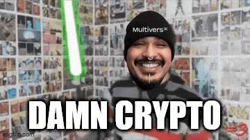 a man is holding a green light saber in front of a wall that says damn crypto .