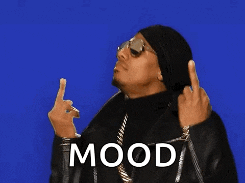 a man wearing a hat and sunglasses is giving the middle finger and the word mood is next to him .
