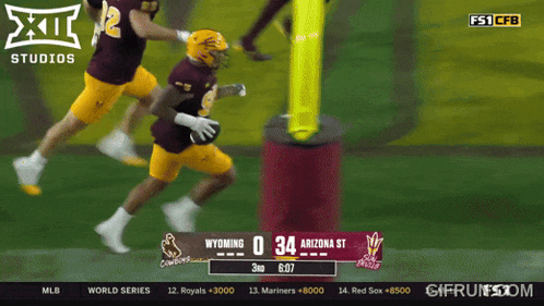 a football game is being played between wyoming and arizona st