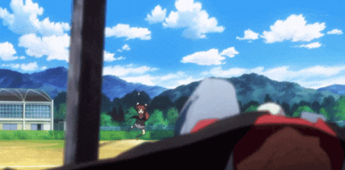 a girl in a red dress is running across a baseball field