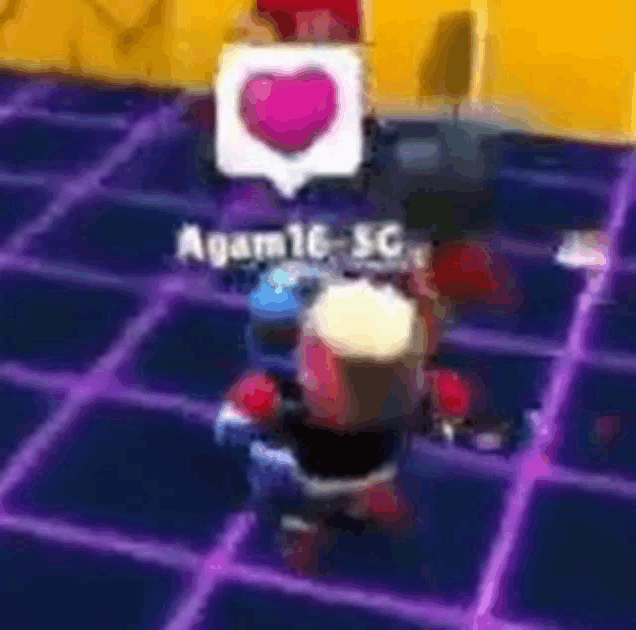 a person playing a video game with a heart in a speech bubble