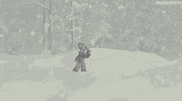 a cartoon character is standing in the snow in a snowy forest .