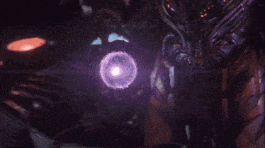 a close up of a purple object with a glowing center