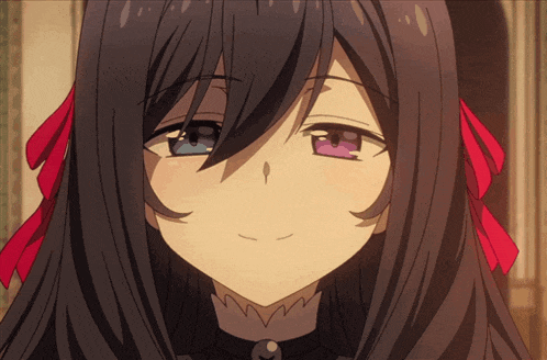 a close up of a girl 's face with long black hair and two different colored eyes
