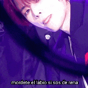 a close up of a man 's face with the words mordete el labio si sas de rena written below him