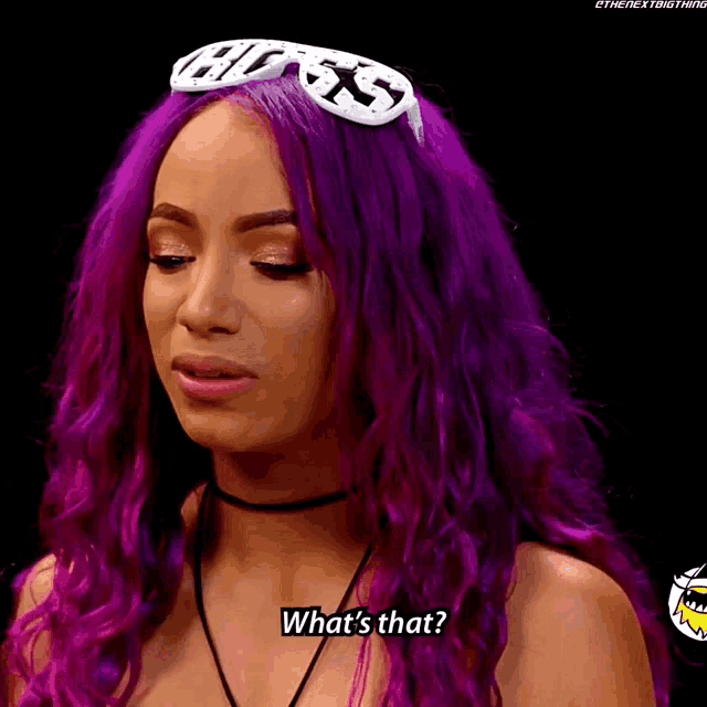 a woman with purple hair is wearing a headband that says boss
