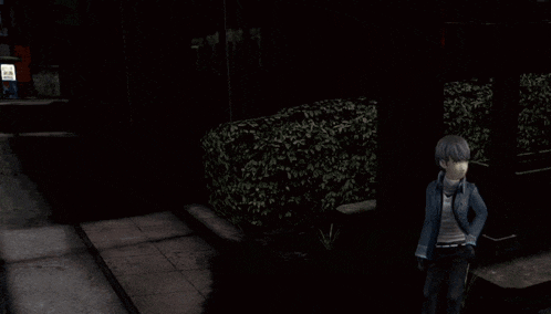 a man in a yellow shirt with the number 2 on it is walking down a dark street