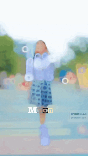 a girl in a plaid skirt and white knee high socks is walking down a street with the word moon in the corner