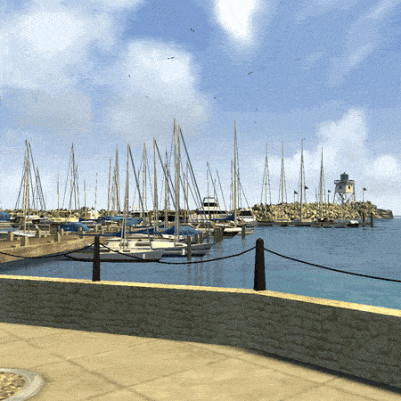 boats are docked at a marina with a lighthouse in the distance