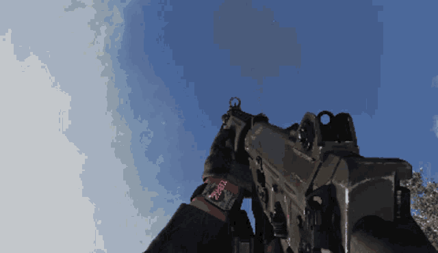 a person holding a gun with a watch on their wrist that says ' coca cola ' on it