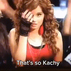 a woman with curly hair covering her face with her hand and the words that 's so kachy below her
