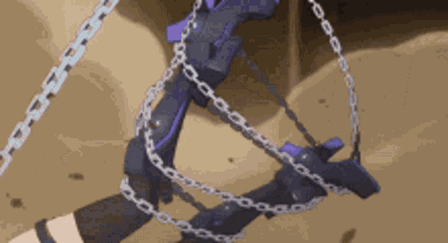 a close up of a chain around a gun
