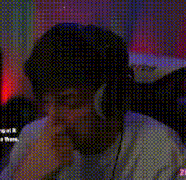 a man wearing headphones looks at the camera with a dollar sign behind him