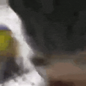 a close up of a person 's foot standing on a table .
