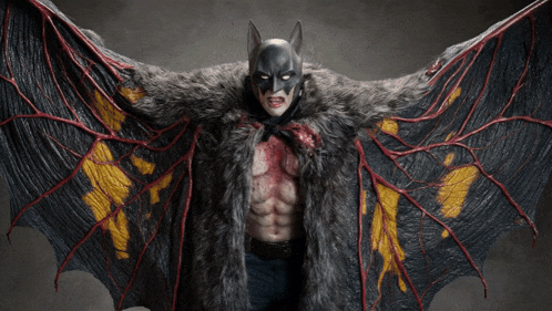 a man in a batman costume with a fur cape