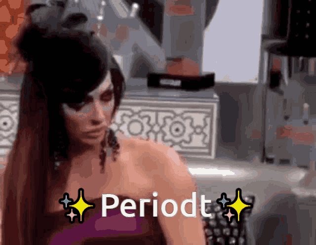 a woman in a purple dress has the word periodt on her face