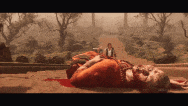 a man is laying on the ground with blood coming out of his mouth and the word mk is on the bottom