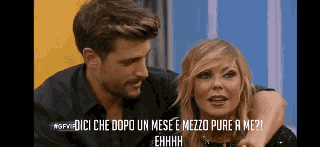a man and a woman are sitting next to each other with a caption that says " ehhhh "