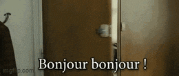 a person is standing in front of a door that says bonjour bonjour !