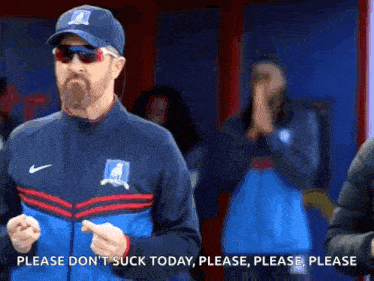 a man wearing a hat and sunglasses says please do n't suck today , please , please , please .