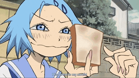 a cartoon girl with blue hair is holding a piece of bread and says " i had bread in my mouth "