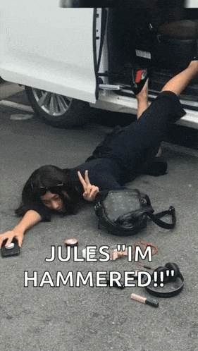 a woman laying on the ground with the words jules im hammered written on the bottom
