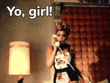 a woman is talking on a telephone in a room with the words yo , girl !