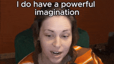 a woman says i do have a powerful imagination in front of an orange wall