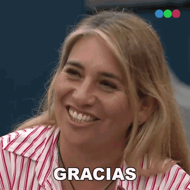 a woman in a pink and white striped shirt is smiling and the word gracias is above her