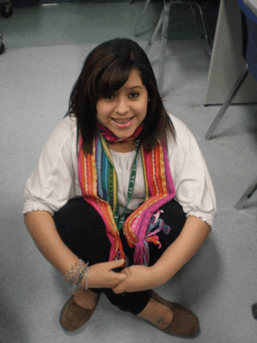 a girl with a lanyard around her neck that says ' virginia '