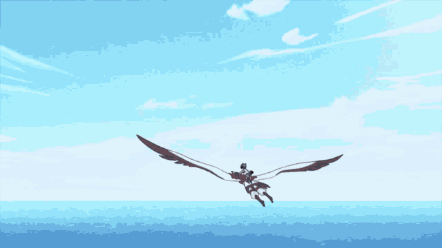 a person is flying in the air with wings spread