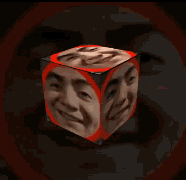 a cube with a man 's face on it and a red circle around it