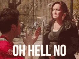 a man and a woman are talking and the woman is saying oh hell no .